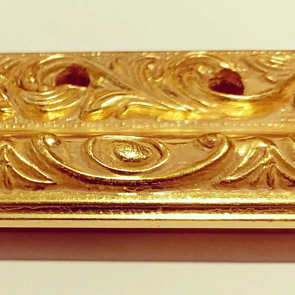 Moldura joya en oro fino